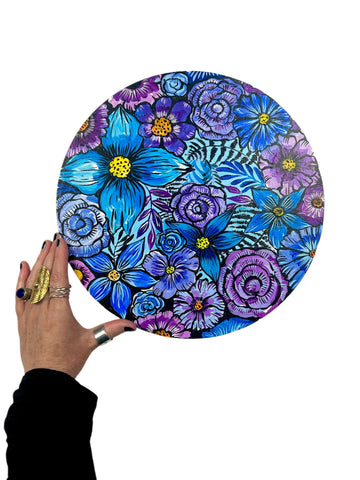 round floral painting