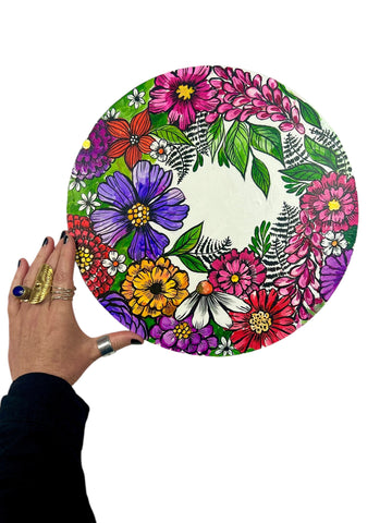 round floral painting